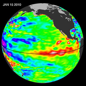 El Niño, a warm-water anomaly that occurs in the Pacific Ocean, is coming back in 2010. This image shows sea-level height data from the NASA/European Ocean Surface Topography Mission/Jason-2 oceanography satellite as of 15 January, 2010. A strong wave of warm water (red areas, where the sea level is higher than normal) can be seen approaching South America. Large El Ninos, such as the largest El Niño of the past century in 1997-98, tend to temporarily force Earth's average temperatures higher for up to a year or more.