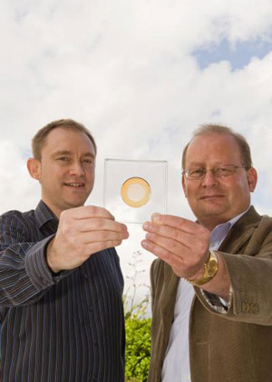 Heads in the clouds: Dr. Raymond Dickie (left) and Professor Robert Cahill (right) with their new cloud-watching device. Courtesy of Queen's University Media Services.