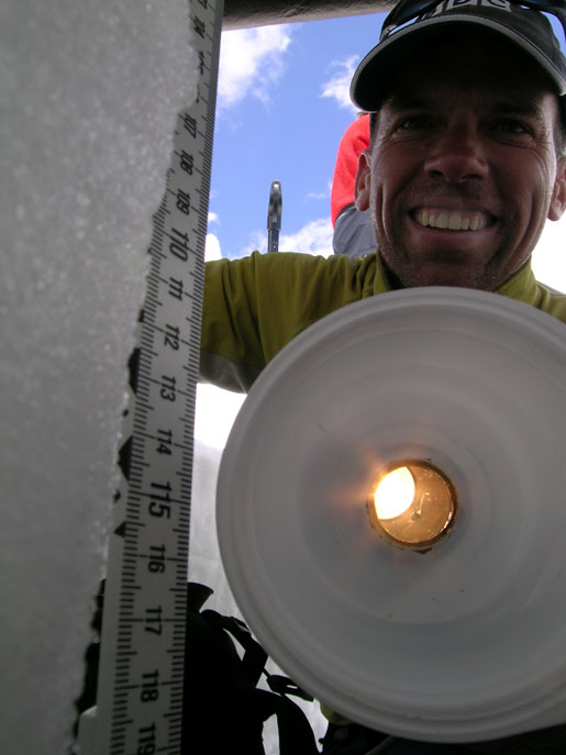 Tom Painter, making measurements of the effects dust has on snowpack.