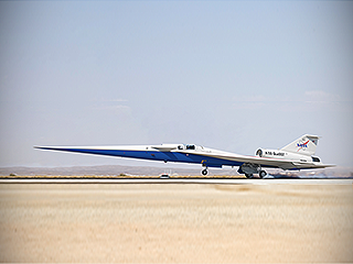 An aircraft with a very pointed nose is about to take off.