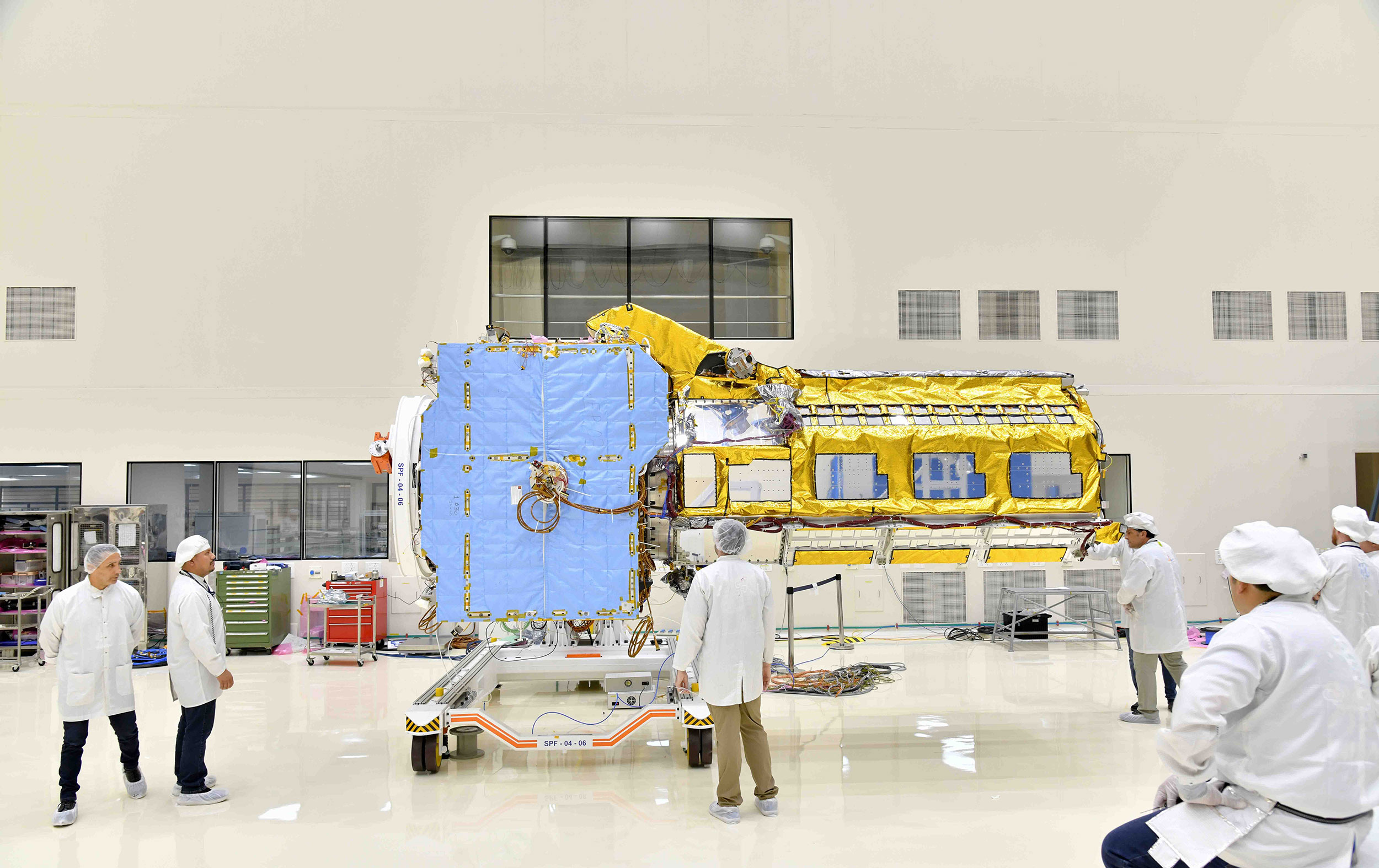 Engineers joined the two main components of NISAR – the spacecraft bus and the radar instrument payload – in an ISRO clean room in Bengaluru, India, in June. The payload arrived from NASA’s Jet Propulsion Laboratory in Southern California in March, while the bus was built at the ISRO facility. Credit: VDOS-URSC
