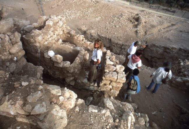 The photos above reveal a fortress emerging from sands excavated by archaeologists and volunteers at the Ubar site. Credit: George Ollen.